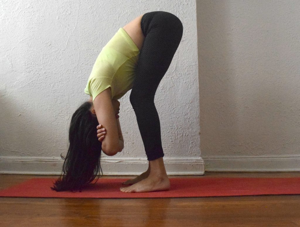 Yoga for digestion - standing forward fold