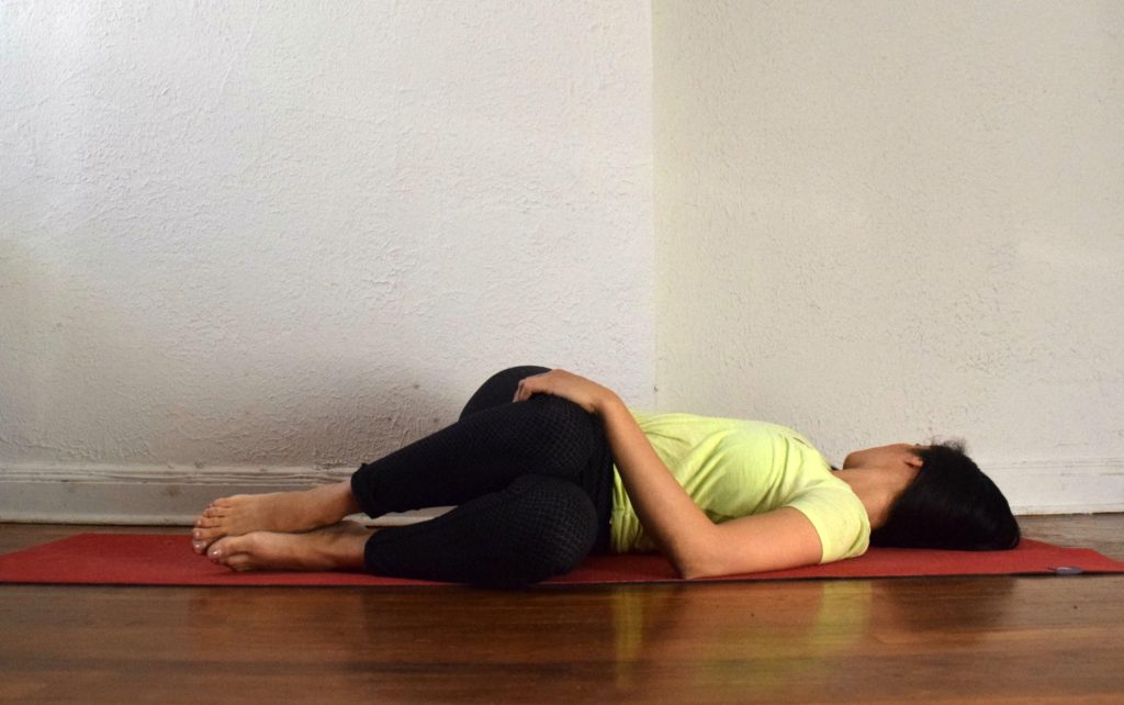 yoga for digestion - reclined twist yoga pose