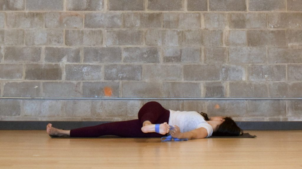 Yoga Poses for runners - Sequence - Revolved-Reclined hand-to-big-toe-pose - Parivrtta-Supta-Padanghustasana - Argentina Rosado Yoga
